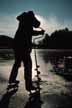 Cutting a hole for ice fishing on Brant Lake